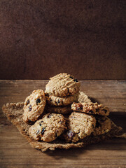 Delicious Homemade Oatmeal Cookies with Raisins on Rustic Background