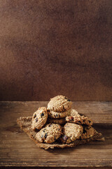 Freshly Baked Oatmeal Cookies on Rustic Wooden Table Surface