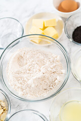 Lemon poppy seed muffins garnished with almond slivers