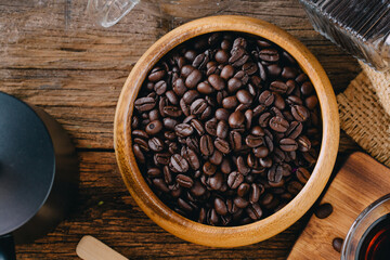 Freshly Roasted Coffee Beans in Wooden Bowl on Rustic Table