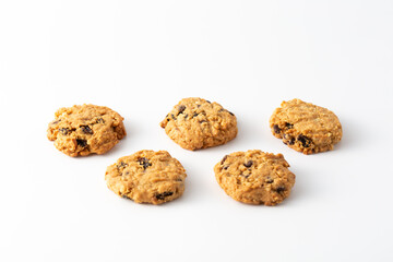 Freshly Baked Oatmeal Cookies with Chocolate Chips on White Surface