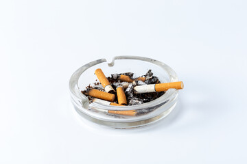 Ashtray with Cigarette Butts and Ashes on a Clean White Background
