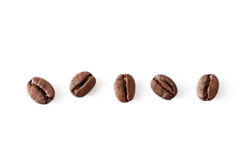 Five Freshly Roasted Coffee Beans on White Background
