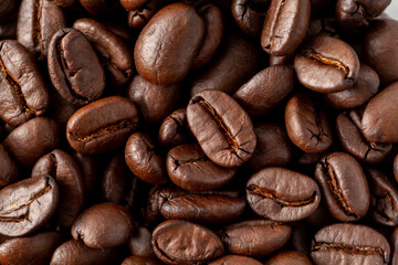 Close-Up View of Dark Roasted Coffee Beans in Natural Arrangement