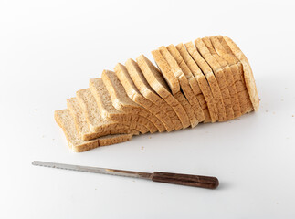 Sliced Bread Loaf with Knife on White Background for Cooking Use