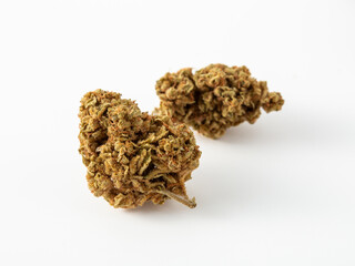 Close-Up of Natural Cannabis Buds on White Background for Wellness