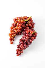 Fresh Red Grapes Cluster Over White Background for Healthy Snacking