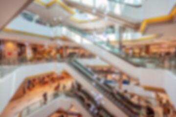 Abstract blur of escalators in a modern shopping mall.