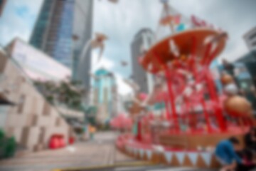 An abstract, out-of-focus view of a shopping mall in Shenzhen, China with bokeh lights in the background.