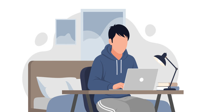 Young man working remotely on laptop from his cozy home office or studying online. Ideal for remote work, education, or freelance concepts.