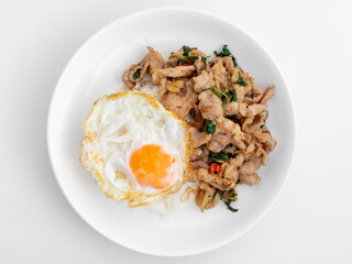 Fried Egg and Stir-Fried Meat with Herbs on White Plate