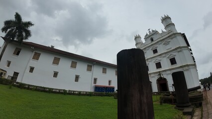 Church and Convent of St. Francis of Assisi in Old Goa, showcasing colonial Portuguese architecture under cloudy skies