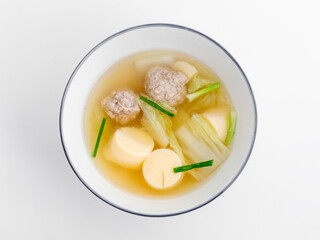 Delicious Meatball Soup with Vegetables in Simple Bowl