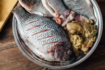 Freshly Caught Fish on Metal Platter Ready for Cooking or Preparation