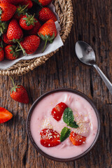 Fresh Strawberry Yogurt with Mint and Whole Strawberries in Basket
