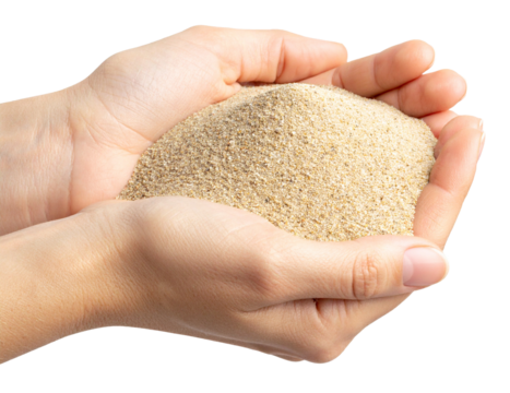closeup of handful of sand beach isolated on white background