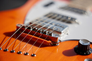 Fototapeta premium Guitar with a volume knob for sound adjustments close-up