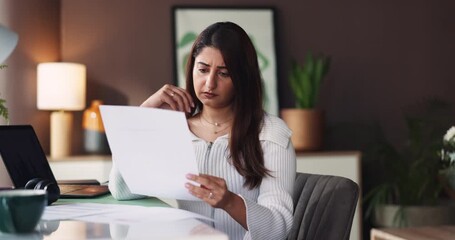 Documents, thinking and savings with woman in house for serious, account report and budget review. Reflection, payment invoice and financial management with person in home office for remote work - Powered by Adobe