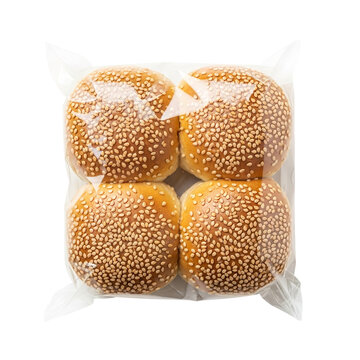 Photo of four sesame seed hamburger buns in a plastic bag, isolated on transparent background