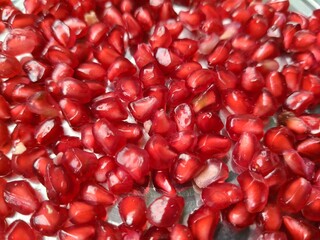 pile of fresh pomegranate seeds.