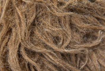 Close-up of brown plush toy fabric texture