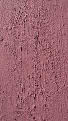 Pink rough plaster wall texture background