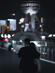 couple with umbrella in shanghai