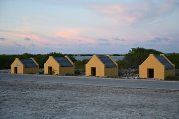 Bonaire, Kralendijk - aerial view over Red Slave (Peleké) huts at sunset in beautiful light
