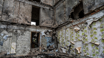 Fototapeta premium ruined street and destroyed houses the city Kiev war in Ukraine
