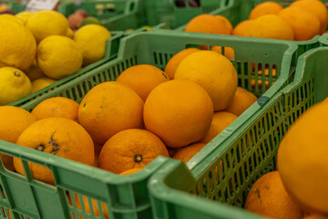 fresh summer fruits and vegetables in the supermarket on the shelf.