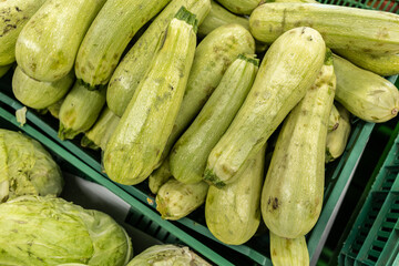 fresh summer fruits and vegetables in the supermarket on the shelf.