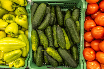 fresh summer fruits and vegetables in the supermarket on the shelf.