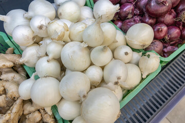 fresh summer fruits and vegetables in the supermarket on the shelf.