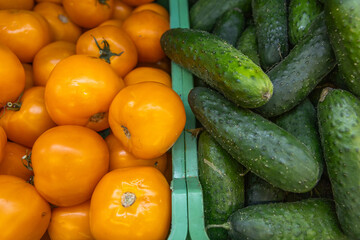 fresh summer fruits and vegetables in the supermarket on the shelf.