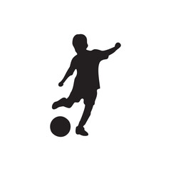 Silhouette of a Child Kicking a Soccer Ball