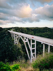 Classic Car on a Long Concrete Bridge