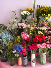 Colourful flowers on a pink background