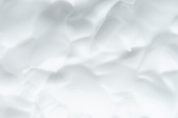 Soft white face cream background