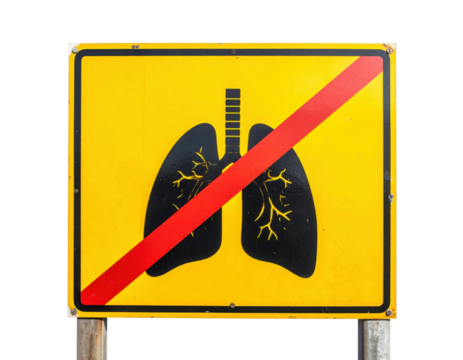 A warning sign depicting lungs with a prohibition mark, emphasizing health and respiratory issues.