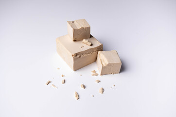 Fototapeta premium pressed yeast on a white background