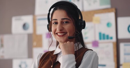 Happy woman, face and consultant with headset for analytics, business performance or advice. Portrait, female person or agent with smile, graph or charts for online review or statistics in workplace - Powered by Adobe