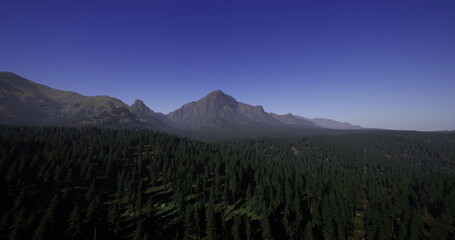 Fototapeta premium Tall mountains dominate the landscape, surrounded by a lush green forest. The sun shines brightly on the peaks, creating a serene and tranquil atmosphere.