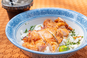 angle view Thai-style chicken with stir-fried Ho Fun or rice noodles and cup of coffee at horizontal composition
