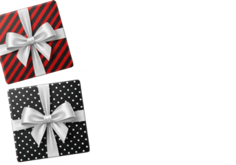 Two beautifully wrapped gift boxes with ribbons and bows isolated on transparent background