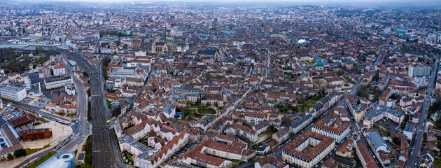 Aerial panoramic view around the old town and city Dijon in France on a cloudy spring afternoon