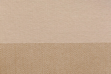 Fototapeta premium Two tone beige textured wallpaper with fine lines and woven pattern