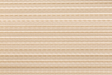 Wallpaper with a pattern of horizontal lines in alternating colors: dark and light, with a soft plaster texture