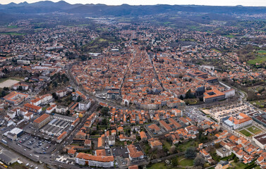 Aerial panoramic view around the old town and city Riom in France on a sunny afternoon