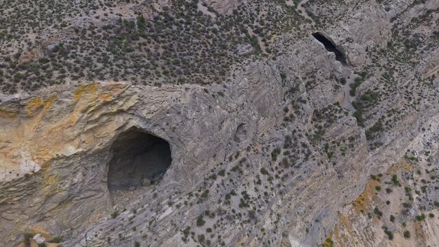 A scenic overlook of the hills at Lewis and Clark Caverns State Park is captured, showcasing the rolling landscape and natural beauty of Montana