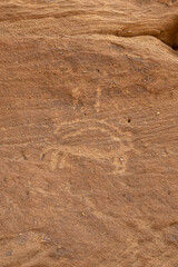 Rock Art or Geoglyph in the desert landscape of AlUla, Saudi Arabia.